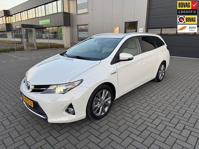 Wit Occasion 2013 Toyota Auris Hybrid Stationwagen | € 10.999 (Eerlijke prijs)