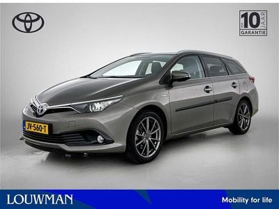 Occasion Toyota Auris Hybrid Trend 136 PK (100 kW) 2016 Grijs (metallic) Hatchback