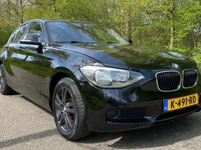 Zwart, metallic lak Gebruikt 2014 BMW 116 Executive Hatchback | € 12.900 (Iets duurder)