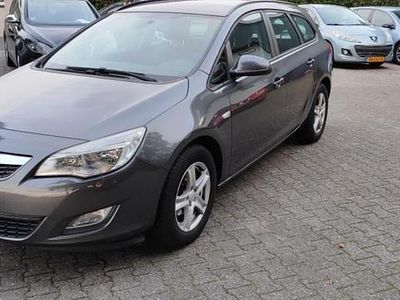 Grijs (metallic) Occasion 2012 Opel Astra Business Stationwagen | € 3.499 (Eerlijke prijs)