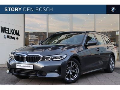 Grijs Occasion 2021 BMW 318 Executive Stationwagen | € 28.450 (Eerlijke prijs)