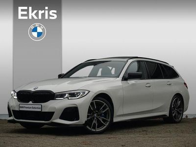 tweedehands BMW M340 3-SERIE Touring i xDrive High Executive 19'' / Panoramadak / Harman Kardon / Stuurwiel verwarmd