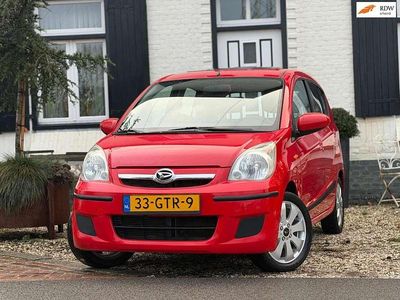 Occasion Daihatsu Cuore 69 PK (50 kW) 2008 Rood (metallic) Hatchback