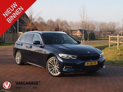 Blauw Occasion 2021 BMW 318 Stationwagen | € 25.990 (Goede deal)