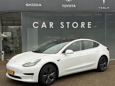 Wit (metallic) Occasion 2020 Tesla Model 3 Standard Range Sedan | € 19.400 (Eerlijke prijs)