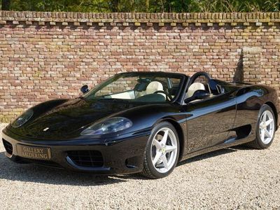 tweedehands Ferrari Daytona 360 Modena Spider F1 Low kilometers example, Livery in "Nero" over beige interior and black softtop, Executed with theseats, Offered with the leather folio containing the manuals and maintenance booklet, Maintained by the