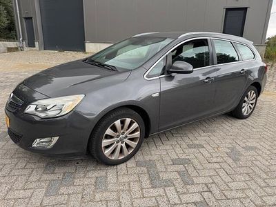 Occasion Opel Astra Cosmo 101 PK (74 kW) 2011 Grijs (metallic) Stationwagen