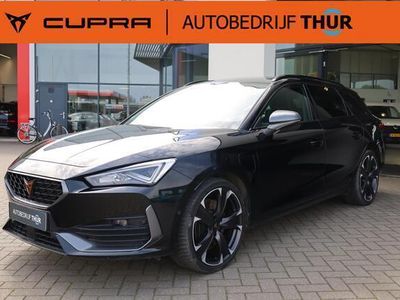 tweedehands Cupra Leon Sportstourer 1.4 e-Hybrid VZ Business 19" LMV achteruitrijcamera park assist klasse III alarm draadloos laden keyless advanced entry en go 12 volt stekker kofferbak LED verlichting vision plus driving profile virtual cockpit navigatie amb