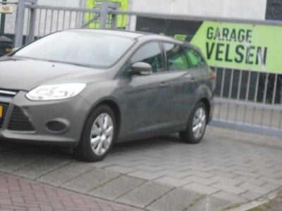 Bruin (metallic) Gebruikt 2012 Ford Focus Trend Stationwagen | € 3.000 (Goede deal)