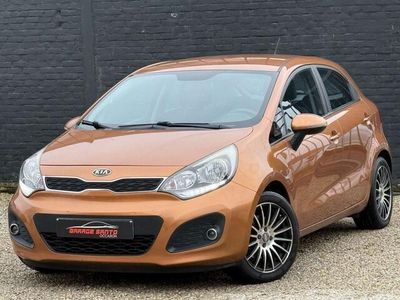 Occasion Kia Rio 90 PK (66 kW) 2013 Oranje Sedan