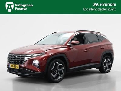 Sunset red (rood metallic) Occasion 2021 Hyundai Tucson Premium SUV | € 30.950 (Eerlijke prijs)