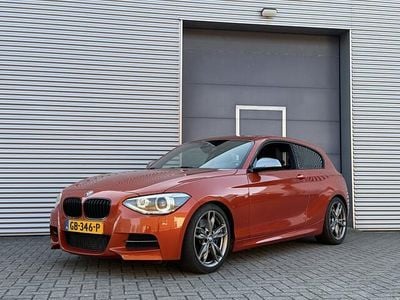 Occasion BMW M135 Executive 320 PK (235 kW) 2014 Oranje (metallic) Hatchback