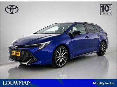 Occasion Toyota Corolla Hybrid Limited 2023 Blauw Stationwagen