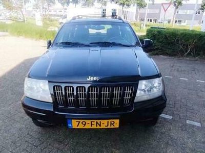 tweedehands Jeep Grand Cherokee 4.7i V8 Limited ((( LEDER/ PLAYSTAION SYSTEEM/ CRU