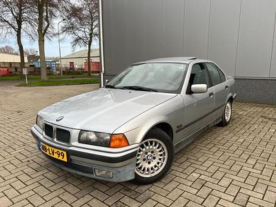Grijs Occasion 1995 BMW 320 Sedan | € 4.499