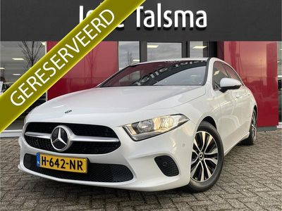 Wit (metallic) Occasion 2020 Mercedes A180 Business Hatchback | € 22.445 (Super prijs)