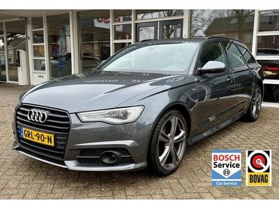 Grijs (metallic) Occasion 2015 Audi A6 S-Line Stationwagen | € 22.800