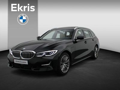 Zwart Occasion 2021 BMW 320e Executive Stationwagen | € 31.400 (Eerlijke prijs)