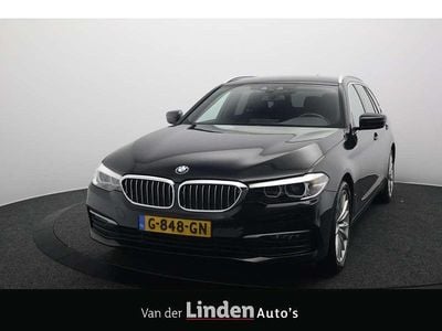 Zwart (metallic) Gebruikt 2019 BMW 520 Executive Stationwagen | € 24.950 (Goede deal)
