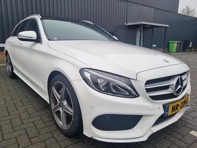 Wit (metallic) Occasion 2017 Mercedes C180 Sport Edition Stationwagen | € 19.749 (Eerlijke prijs)