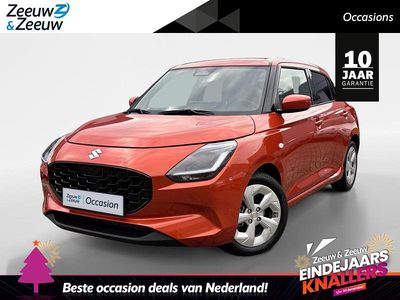 Flame pearl orange Gebruikt 2024 Suzuki Swift Hatchback | € 19.940 (Eerlijke prijs)