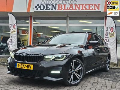 Zwart (metallic) Occasion 2021 BMW 320e Executive Stationwagen | € 19.950 (Iets duurder)
