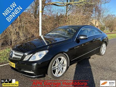 Zwart Occasion 2012 Mercedes E200 Avantgarde Coupé | € 12.975 (Eerlijke prijs)