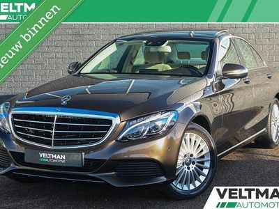 Bruin Occasion 2016 Mercedes C180 Prestige Sedan | € 19.995 (Eerlijke prijs)