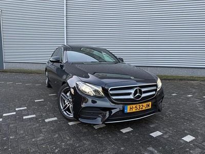 Zwart (metallic) Occasion 2019 Mercedes E220 AMG line Sedan | € 16.450 (Super prijs)