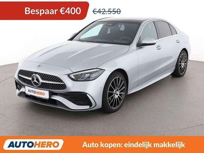 Grijs Occasion 2022 Mercedes C300e AMG line Sedan | € 42.349 (Eerlijke prijs)