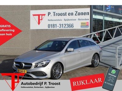 tweedehands Mercedes CLA180 Shooting Brake Ambition AMG Automaat/Navigatie/Sfeerverlichting/LED/Apple carplay/Elektrische achterklep/Stoelverwarming/Parkeersensoren/Climate control/Cruise control/Keyless/Bluetooth