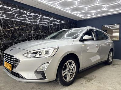 Grijs, metallic lak Occasion 2019 Ford Focus Business Edition Stationwagen | € 14.950