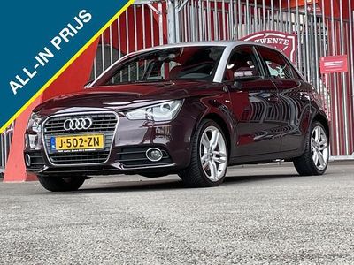 Paars (metallic) Gebruikt 2012 Audi A1 Sportback Attraction Hatchback | € 10.950 (Eerlijke prijs)