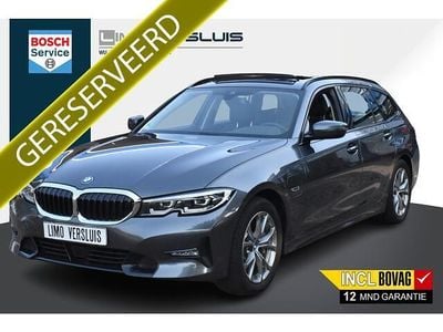 Grijs Gebruikt 2022 BMW 330 Executive Stationwagen | € 32.950 (Goede deal)