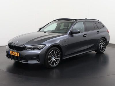 Occasion BMW 320e Sport Line 204 PK (150 kW) 2022 Mineralgrau metallic (b39) Stationwagen