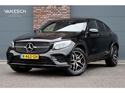 Zwart (metallic) Occasion 2019 Mercedes GLC250 AMG line Coupé | € 36.500 (Super prijs)