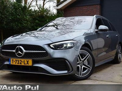 Occasion Mercedes C300e AMG line 313 PK (230 kW) 2023 Grijs Stationwagen