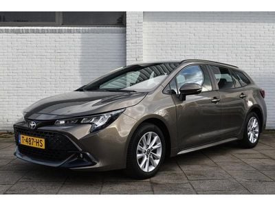 Occasion Toyota Corolla Hybrid Active 98 PK (72 kW) 2023 Bruin Stationwagen