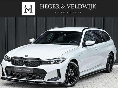 Wit Gebruikt 2024 BMW 330e M Sport Stationwagen | € 48.900 (Eerlijke prijs)