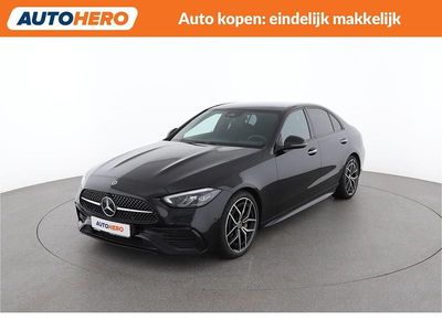 Zwart (metallic) Occasion 2022 Mercedes C300e AMG line Sedan | € 43.650 (Iets duurder)