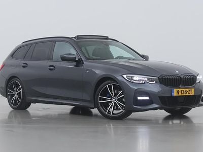 Grijs Occasion 2021 BMW 320 Executive Stationwagen | € 20.800 (Duur)