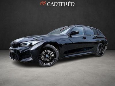 Zwart Occasion 2022 BMW 330 M Sport Stationwagen | € 34.800 (Goede deal)