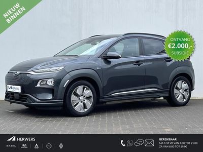 tweedehands Hyundai Kona EV Premium 64 kWh Automaat / Warmtepomp / 3 Fase laden / €2.000,- subsidie mogelijk / Lederen bekleding