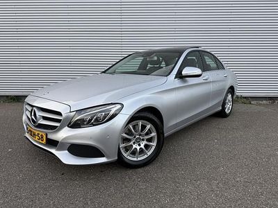 Grijs (metallic) Occasion 2014 Mercedes C180 Sedan | € 11.950 (Eerlijke prijs)