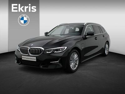 Zwart Occasion 2022 BMW 320e Executive Stationwagen | € 31.450 (Eerlijke prijs)