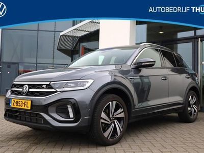 tweedehands VW T-Roc 1.5 TSI R-Line Ergo stoel leder alcantara achteruitrijcamera 18" LMV elektrische achterklep keyless entry en go park assist stoel en stuurwiel verwarming privacy glas LED Plus koplampen carplay navigatie draadloos