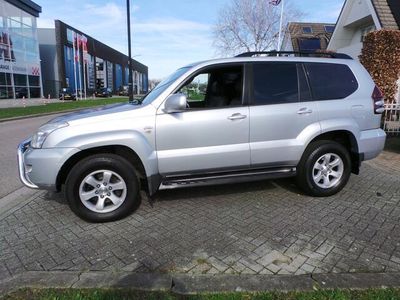 tweedehands Toyota Land Cruiser 3.0 D-4D Van Aut. Airco,CVruise,Leder,Pdc,Trekhaak 3500kg trekken Grijs kenteken