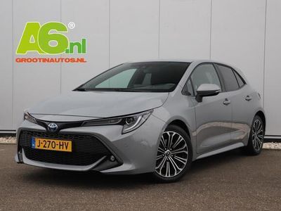 tweedehands Toyota Corolla - 2.0 Hybrid Business Plus Automaat Navi Camera Clima JBL Rijstrooksensor Keyless 18 inch Stuur & Stoelverwarming