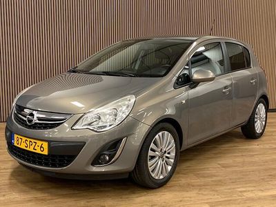 Bruin Occasion 2011 Opel Corsa Cosmo Hatchback | € 5.945 (Eerlijke prijs)