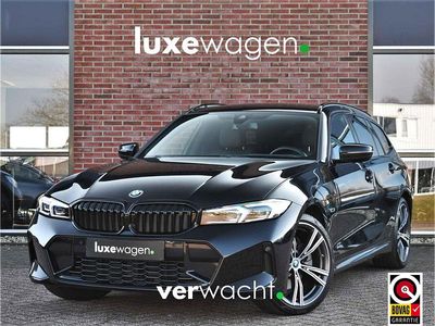 Occasion BMW 330e M Sport 292 PK (214 kW) 2023 Zwart (metallic) Stationwagen
